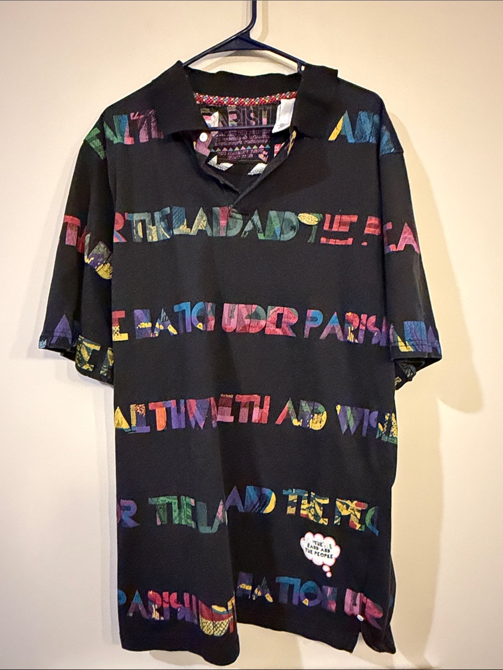 Parish Nation Men's Black Polo Shirt with Multicolor Graphic Text